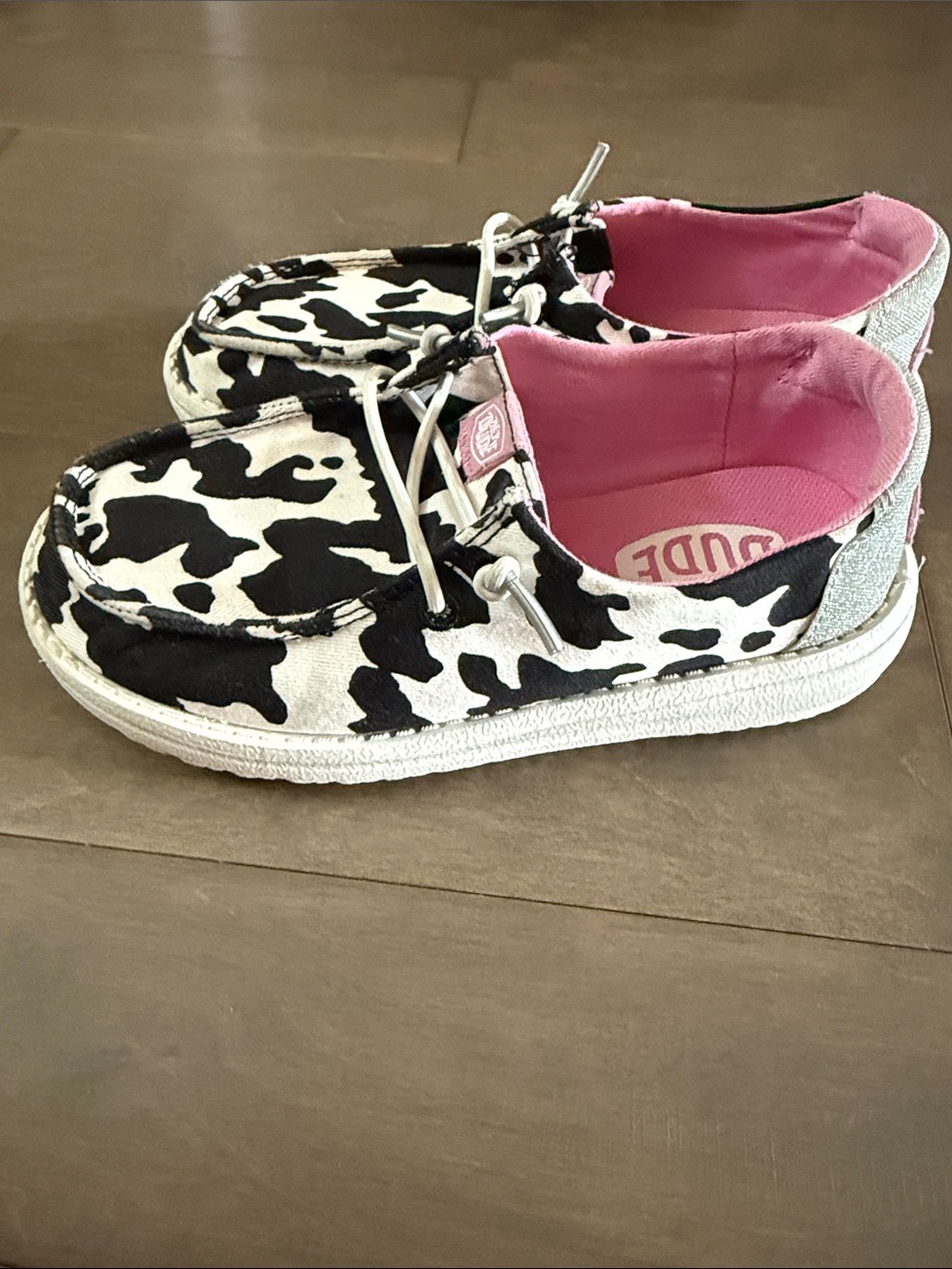 Hey Dude Kids Cow Print Slip-On Sneakers in Black, White & Pink - Picture 3 of 3